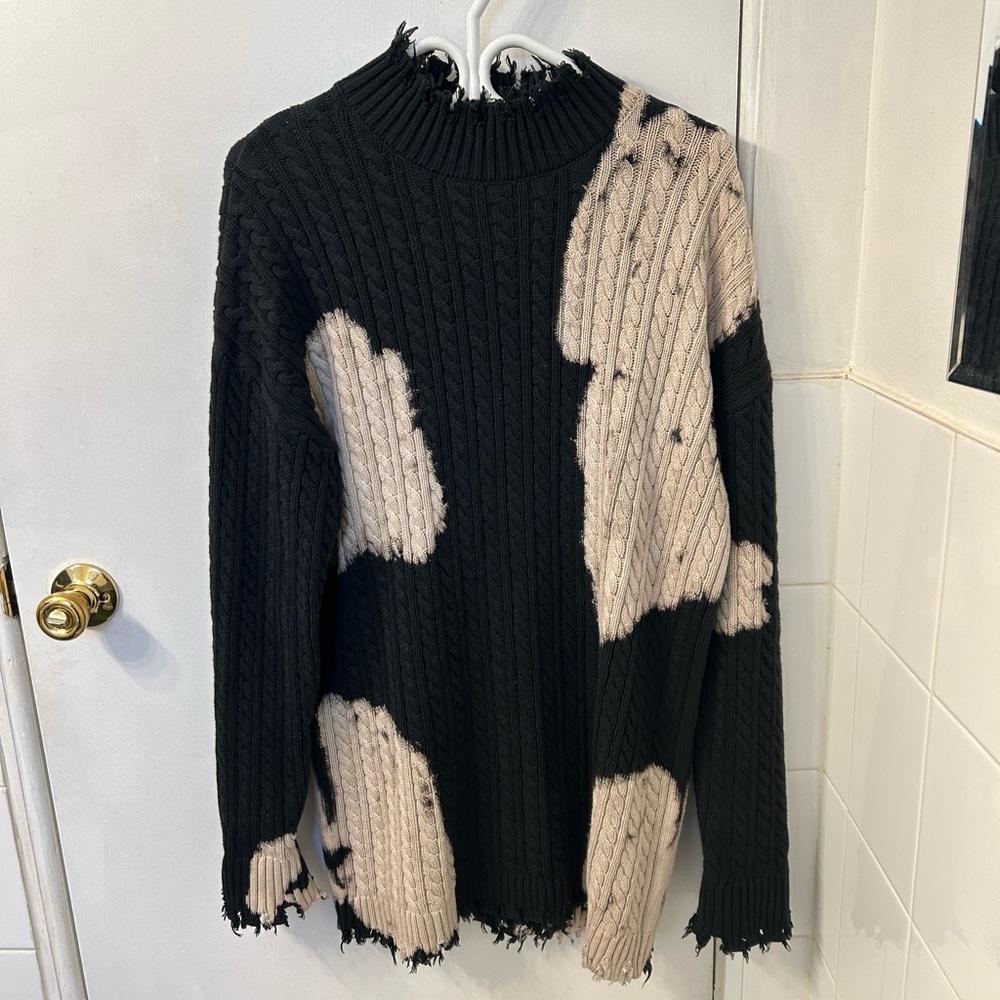 Acid burnout oversized sweater or sweater dress depending on fit.
